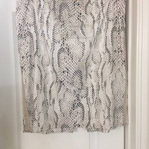 White House Black Market Animal print skirt.